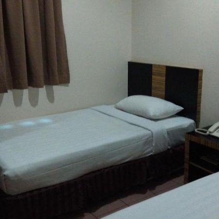 Hotel Traveller Kota Kinabalu Quarto foto