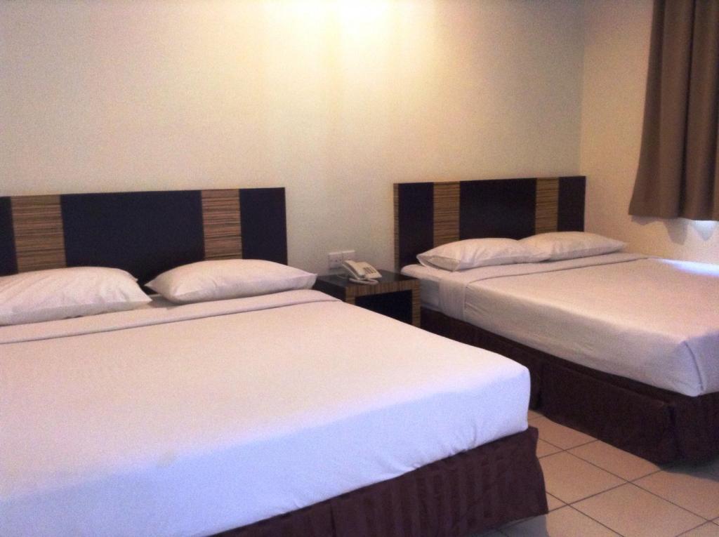 Hotel Traveller Kota Kinabalu Quarto foto